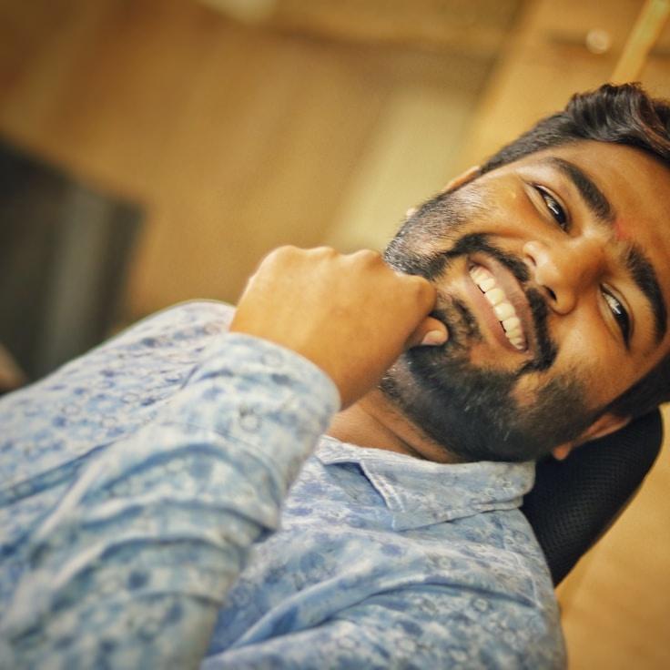 Alexis Chen, Lead Design Curator at Misty Harbor Lumen, reviewing corporate floral arrangements